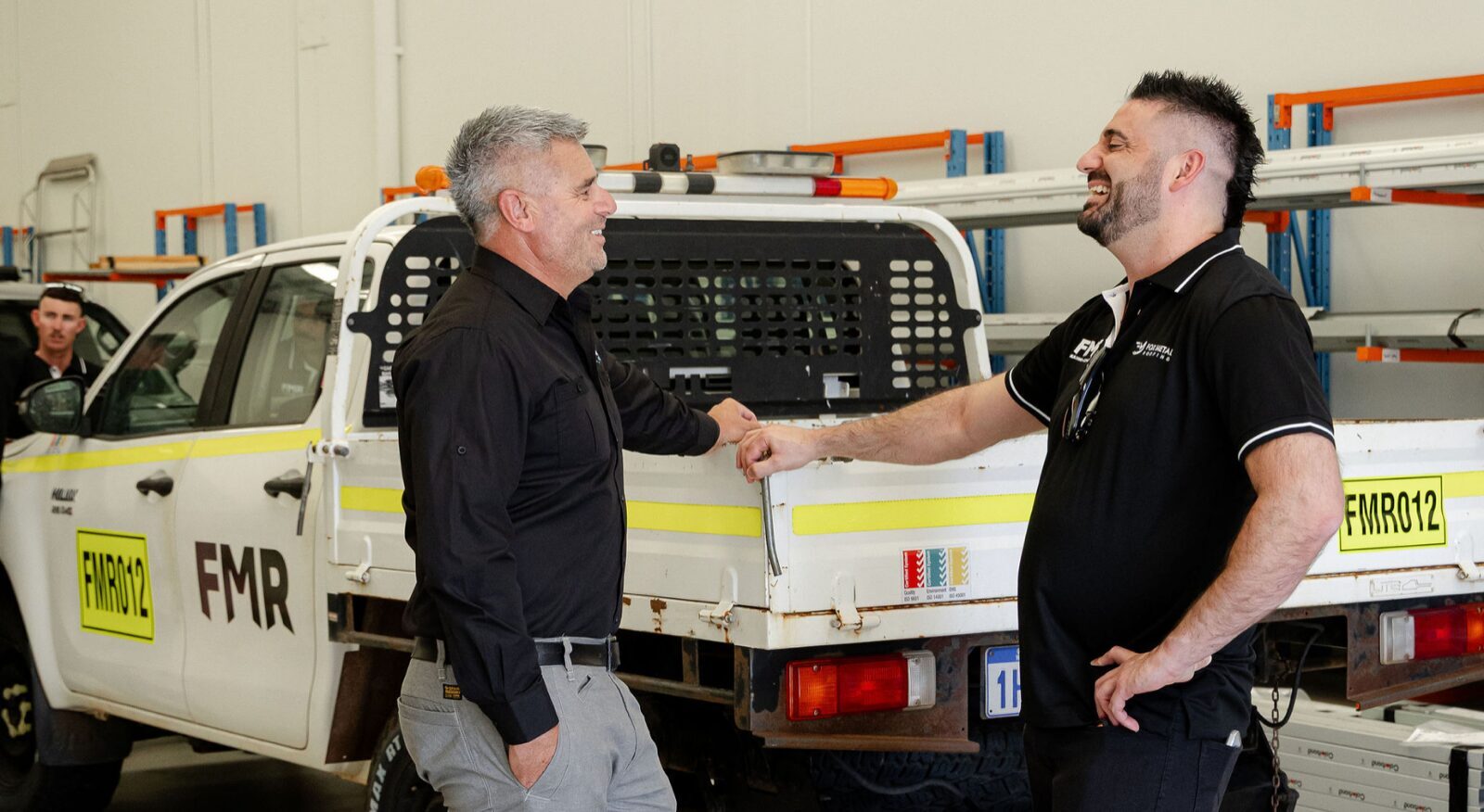 Jay Fox with an FMR crew member on site